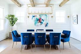 Which products in blue dining chairs are exclusive to the home depot? Blue Velvet Dining Chairs Sit On A Sisal Rug Around A Reclaimed Wood Trestle Dining Ta Blue Velvet Dining Chairs Velvet Dining Room Chairs Velvet Dining Chairs