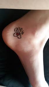 🐾paw tattoo symbolize the dog within you. Pawprint Tattoo With Heart On Inside Of Foot Ankle Area Print Tattoos Pawprint Tattoo Tattoos