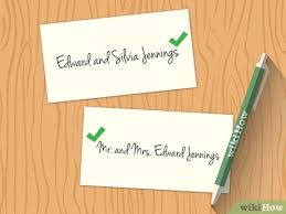 From planting the cards in pots of flowers, to hanging them on an elaborate ribbon wall, the. 3 Ways To Address Guests On Escort Cards Wikihow
