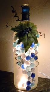 Wine Bottle With Lights Inside Decorative Wine Bottle Light Embellished With Blue Glass Gems Leaves B Bottles Decoration Wine Bottle Decor Bottle Crafts