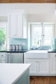 A backsplash is a wall covering that protects drywall from unintended splashes of liquid. Profile Cabinet And Design Tiffany Blue Kitchen White Kitchen Backsplash Beach House Kitchens