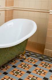 Beige herringbone tile is a clever way to make a tiled bathroom and shower floor look like a wooden floor. 23 Vintage Tile Design Ideas Sebring Design Build