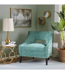 The gentle curves and rounded frame are accented by round splayed pecan finished legs. Accent Chairs Open Back Accent Chair