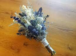 Fall is a season about celebrating natural beauty, and a fall wedding is an opportunity to do the same. Pin By Ray L On Wedding Dresses Blue Wedding Bouquet Tropical Wedding Flowers Wedding Flowers