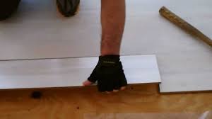 Pergo can be installed in a bathroom, but it is not recommended. White Color Pergo Laminate Flooring Youtube