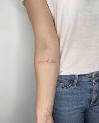 Saudade Tattoo By Conz Thomas Inked In A Minimalist Font On The Right Forearm Tattoos Red Ink Tattoos Elbow Tattoos