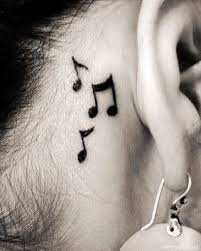 Top 15 Musical Tattoo Designs Tramp Stamp Tattoos Tattoos Fake Tattoos