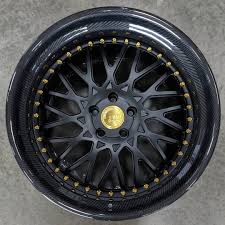 Black And Gold Bbs Rims Revolutionize Flyin Z33 S Nissan 350z On Our F142 In Matte Black With Carbon Fiber Lip And Candy Gold Hardware Sho Carbon Fiber Nissan Z Cars Wheel