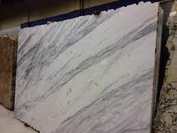 If you're considering quartzite for your kitchen countertops, you're probably wondering how it compares to the other materials available, especially other stones. Will Super White Quartzite Stain
