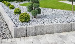 Randsteine Der Rahmen Fur Ihr Garten Kunstwerk Garten Landschaftsbau Vorgarten Pflanzen Kiesgarten