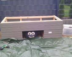 Hochbeet Mit Mahrobotergarage Aus Wpc Noch Nur Teilbefullt Bauanleitung Zum Selberbauen 1 2 Do Com Deine Heimwe Hochbeet Garage Mahroboter Hochbeet Bauen