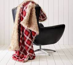 Made from soft coral fleece on the front and thick, plushy sherpa on the back, our buffalo plaid design is a hit! Nottingham Faux Fur Plaid Throws Pottery Barn