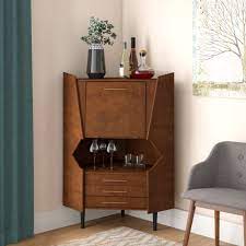 The lower cabinet features a metal wine rack with a capacity of 13 bottles, and two fixed shelves, which offer storage for spirits, mixers, and bartender\'s guides. Corner Bar Wine Cabinets Free Shipping Over 35 Wayfair