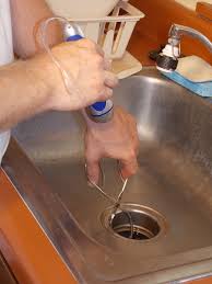 how to unclog a garbage disposal