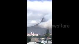 Fanned by gusts of wind, the fire engulfed and destroyed a hillside restaurant and a mill. Yqw9p6rtuthn4m