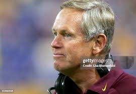 Quarterback Caleb Hanie of the Colorado State Rams looks to hand the...  News Photo