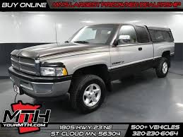 Image result for Medium Driftwood 1997 Chrysler