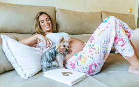 Experts Reveal Why Your Dog Likes Lying On Your Pregnant Stomach