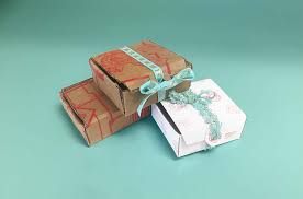 Wooden boxes are classic, and they make for an easy build (or an easy find at an antique store or craft retailer). Diy Cardboard Box Gift Boxes With Lace Ties