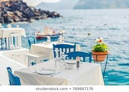 Greece Santorini Restaurant Greece Santorini Restaurant With Served Table In Seafront Of Aegean Sea On Santorini Cy Cyclades Islands Santorini Cyclades