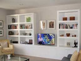 Because the storage unit is so long, it doesn't need to be very wide, which allows the homeowners to enjoy more floor space. Fitted Furniture Four Corners Handmade