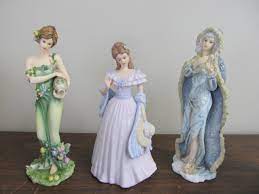 Grace patricia is dressed in a strapless cream colored ball gown with elbow length gloves and a strand of pearls. 3 Tall Home Interiors Lady Figurines Little Canada Estate Auction Antiques Collectibles New Items Huge Variety K Bid
