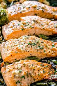 Garlic Butter Baked Salmon Tender And Juicy Salmon Brushed With An Incredible Garlic Butter Sauce And B Baked Salmon Recipes Baked Salmon Easy Salmon Recipes
