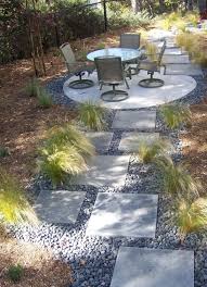 As you can see in the pictures below the landscaper has used a large flat rock or paver to make the stepping stones and surrounded them with rounded pebbles. The 2 Minute Gardener Photo Modern Stepping Stone Pathway Stepping Stone Pathway Modern Backyard Small Patio Garden