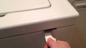 Pry a putty knife about six inches inward from each front corner to press each tab. Old School Maytag Remove Top Youtube