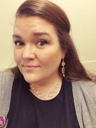 still wearing high school earrings