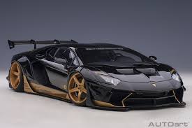 From it's sharp lines, bold interior and elegant styling, the aventador remains as one of lamborghini's flagship models. Liberty Walk Lb Works Lamborghini Aventador Limited Edition Black With Gold Accents Autoart