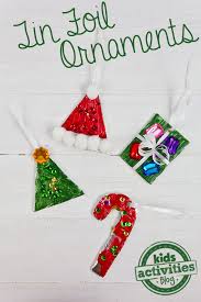 White christmas tree with red decorations. Christmas Activity Tin Foil Diy Ornaments