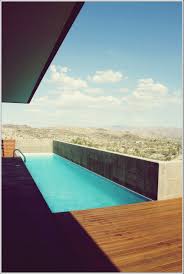Die Vorteile Von Lap Pools Und Ihren Markanten Designs Deko Trend Swimmingpool Schwimmbad Designs Hauser Mit Pool