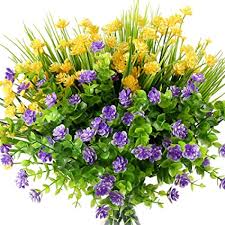A range of artificial trees in many species, shapes, styles, and sizes. Auihiay 12 Bundles Artificial Flowers Outdoor Fake Greenery Artificial Plants For Hanging Planter Home Wedding Porch Window Decor Yellow Purple Green Amazon Co Uk Home Kitchen