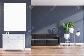 Ordinary grey and blue living room a bright shade of blue works well with both dark and light shades of grey. Interior Of Stylish Living Room With Dark Blue Walls Wooden Stock Photo Picture And Royalty Free Image Image 138088298