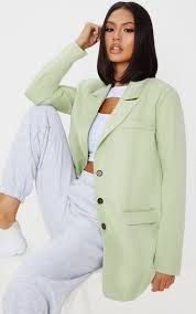 Parfaitement galbée par des découpes princesse devant et dos, cette veste ichi vous offre tout le confort d'une maille souple et très confortable. Apple Green Oversized Woven Blazer Prettylittlething