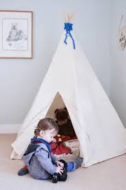 Cut a length of rope and thread through all five of your poles. 15 Diy Teepees For Fun Kids Playrooms