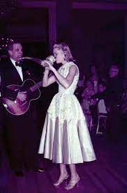 Grace Kelly Takes A New Year Drink From A Traditional Horn Offered By Col Serge Obolensky At A White Rus Grace Kelly Style Princess Grace Kelly Princess Grace