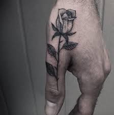 12 roses tattoos on side. Rose Finger Tattoos For Men Rose Tattoo On Finger