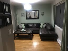 Even the dog bed receives a sage green upholstery treatment. Sage Green Living Room Sage Green Living Room Living Room Green Green Living