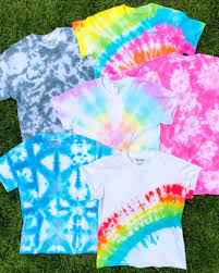 Lay a damp shirt flat on a plastic drop cloth. How To Tie Dye 101