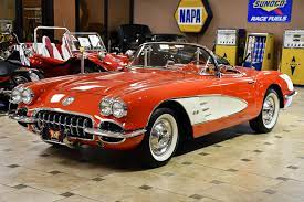 Wide whitewall tires and 1958 caps. 1958 Chevrolet Corvette Ideal Classic Cars Llc