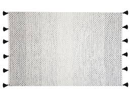 Wolle ist ein natürlicher, nachwachsender rohstoff, welcher schon seit jahrtausenden zu. Teppich Wolle Schwarz Weiss 140 X 200 Cm Kurzflor Gemlik Beliani Fr