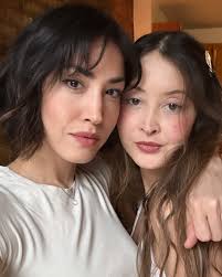 I got bangs 😛😛 Here are too many selfies and an attempt at a photoshoot  with my cat