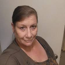 Man in black walks to work and visits friend