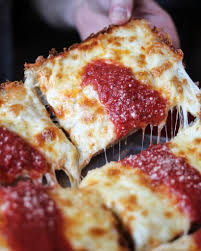 Add everything but the water into a large bowl and stir. What Is Detroit Style Pizza Why People Love It 2020