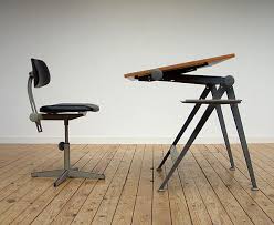 It sports a rustic oak finish that enhances its natural look. Friso Kramer Industrial Drafting Table And Chair 1954 Furniture Love