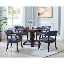 Transitional eating area, dining room with raw wood table and tufted chairs by rae duncan interior design. Steve Silver Tournament Navy Blue Faux Leather Arm Chair With Casters Tu500an