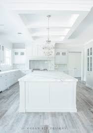 If dark feels a bit too overwhelming for your kitchen or style, go a few shades lighter. Our 5 Best Kitchen Designs By Ocean Blu Designs Grey Kitchen Floor Home New Kitchen Designs