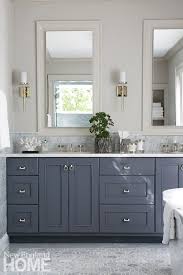 Master Bathroom With Dark Gray Vanity Light Gray Floors Two Mirrors Over The Double Sink And Off Wh Master Bathroom Vanity Grey Bathroom Vanity Grey Flooring